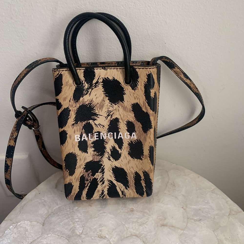 BALENCIAGA
Animal Print Phone Holder Shopping Bag